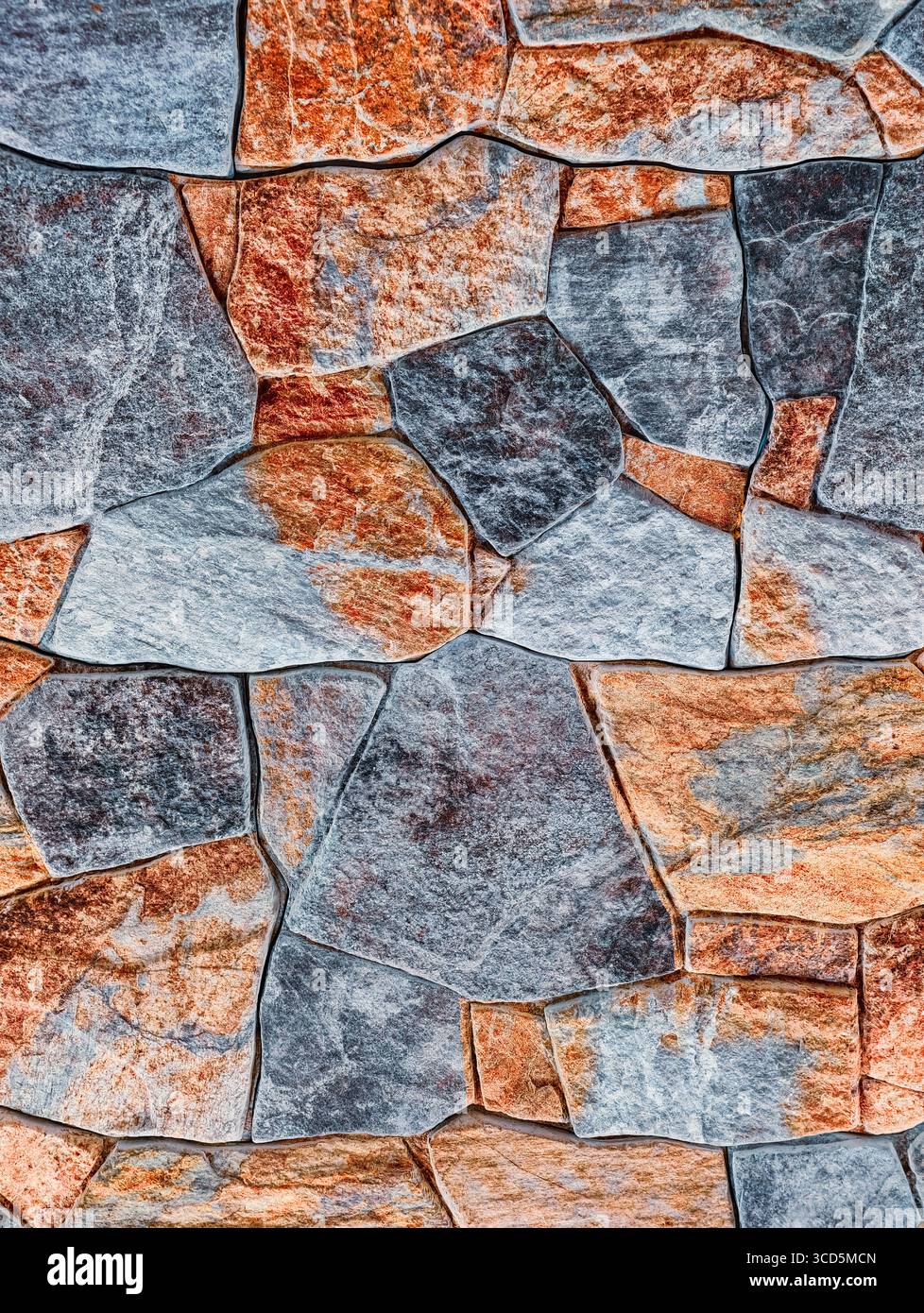 Sfondo in pietra: Parete in pietra rustica multicolore per l'arredamento della casa, la progettazione del paesaggio e i materiali di marketing creativi. Fotografia di scorta Foto Stock