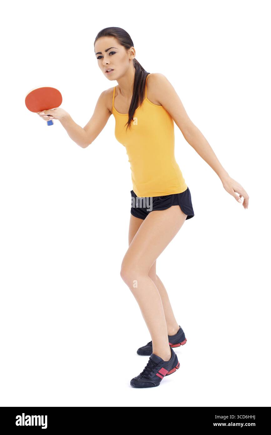 Una giocatrice di ping-pong è pronta a servire una palla Foto Stock