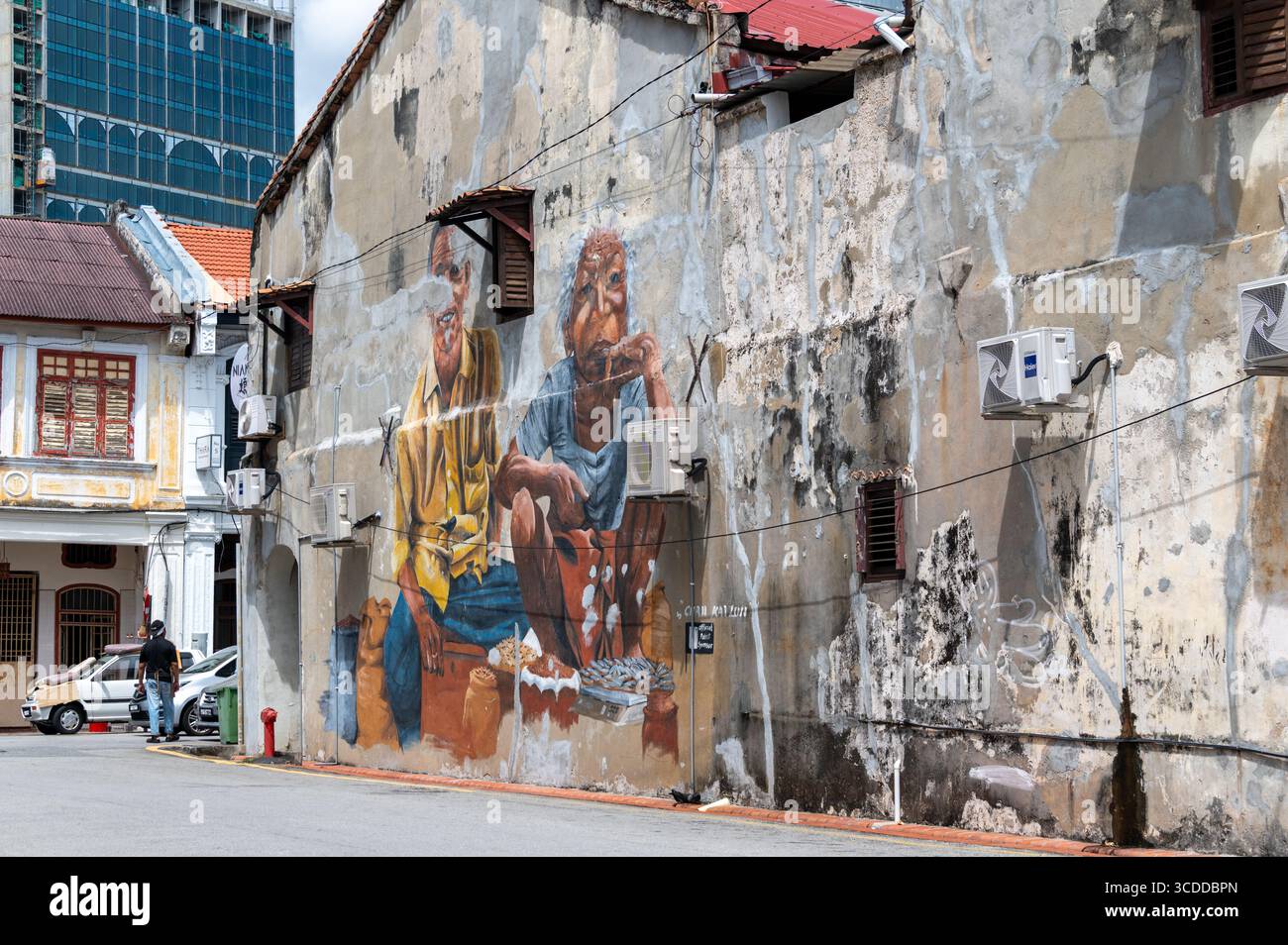 Un murale di «Fish Lane» dove i venditori vendevano pesce, pesce salato essiccato e varie spezie. Dipinto dall'artista locale Chan Kai Lun su Lorong I. Foto Stock