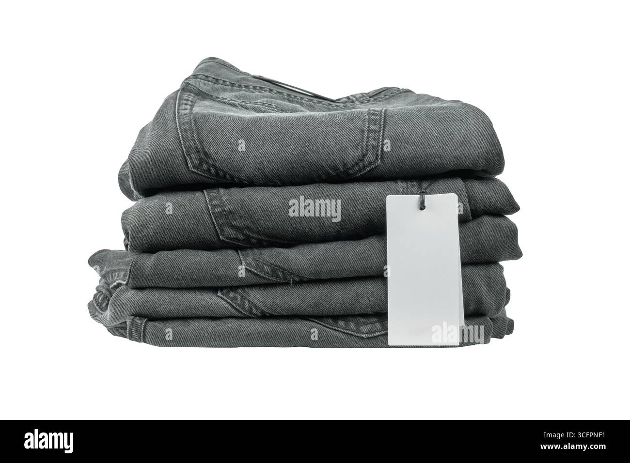 Jeans in denim grigio scuro disposti in modo ordinato con cartellino a prezzi visibili Foto Stock