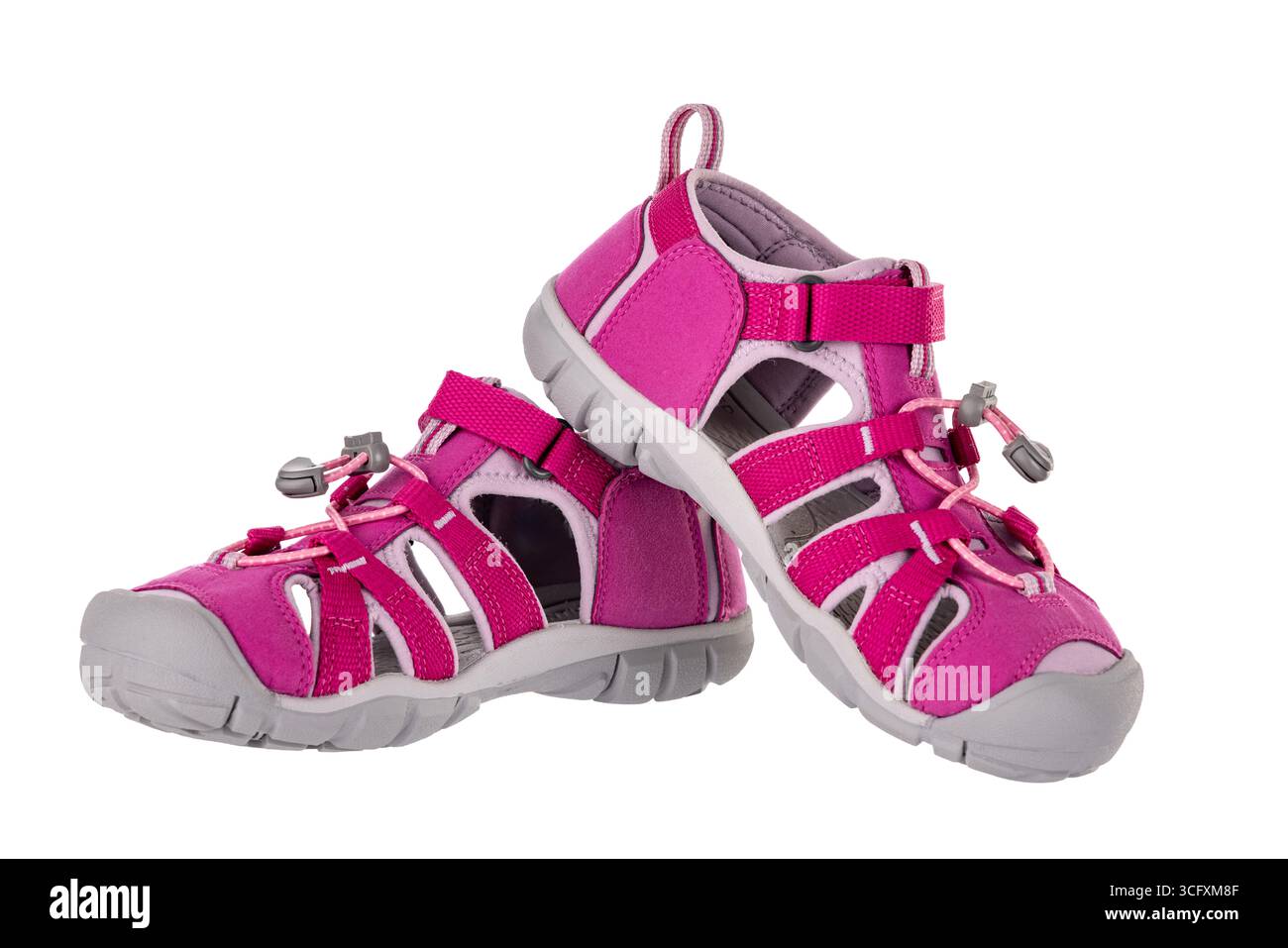 Coppia di sandali rosa da avventura all'aperto con suole camouflage per escursioni Foto Stock