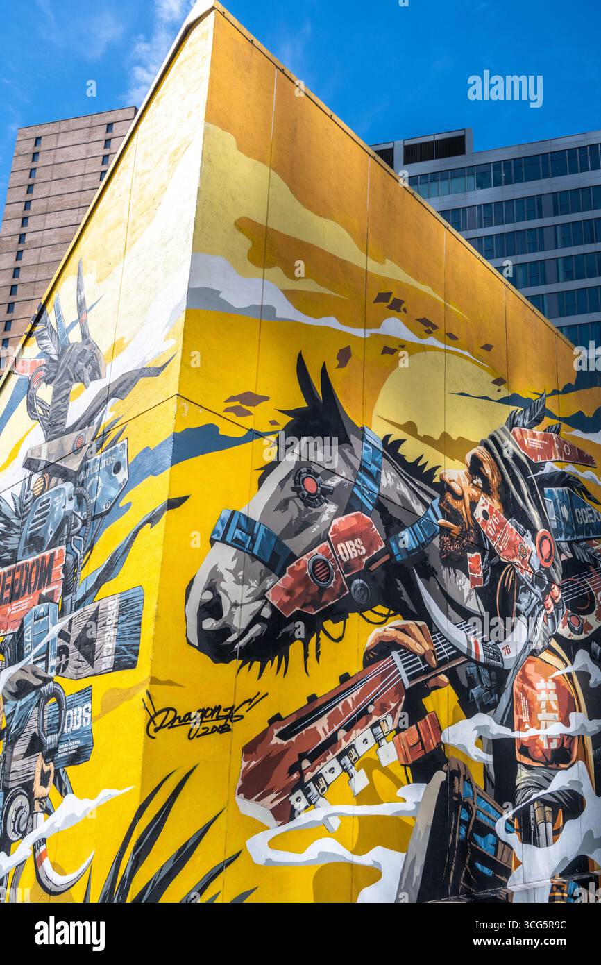 Grande murale di un uomo con un cavallo a New York Foto Stock