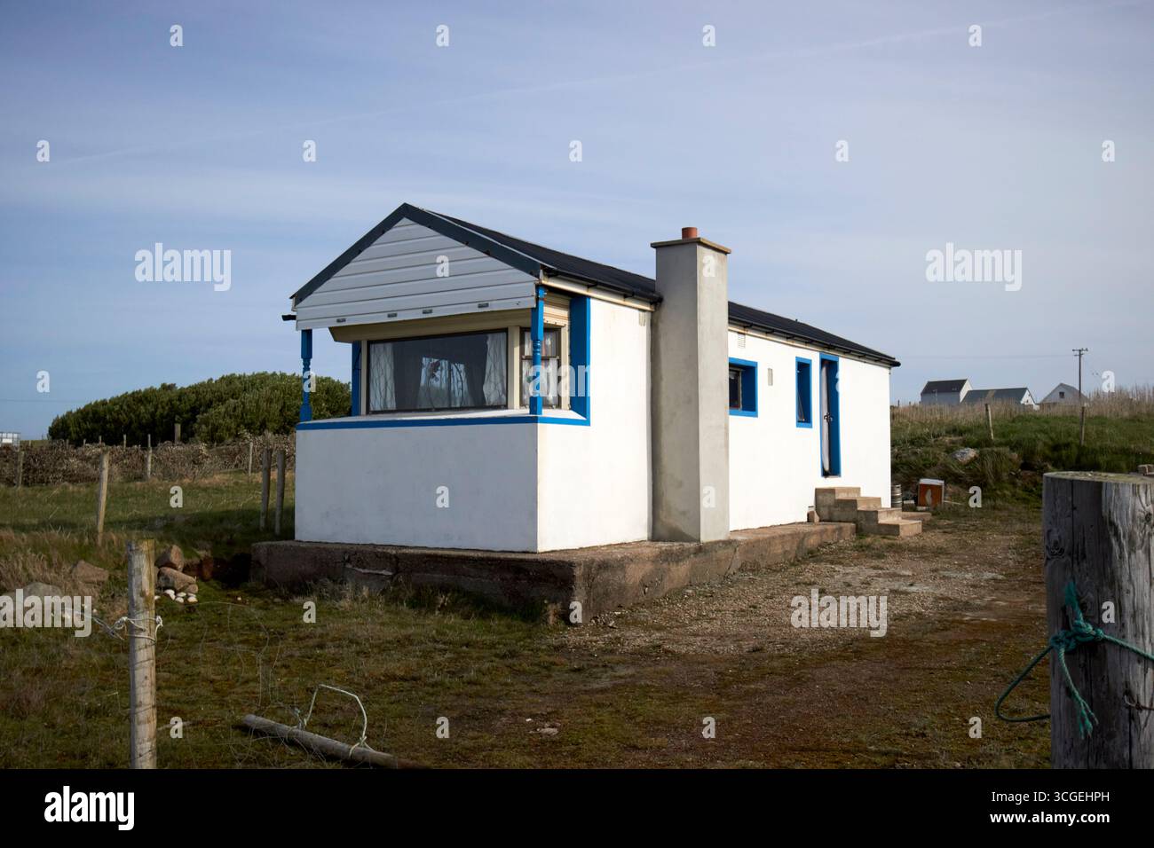casa realizzata da una casa mobile con mattoni di mattoni che si affacciano sulle pareti dell'isola di tory, contea di donegal, repubblica d'irlanda Foto Stock