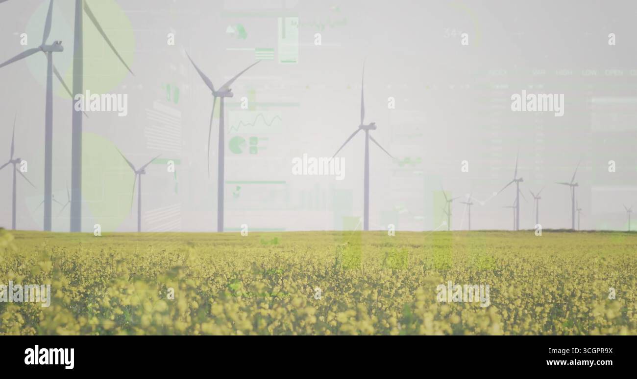 Turbine eoliche rotanti che si innalzano sulla pianura rurale, mostrando canola gialla con sovrapposizioni cartografiche digitali Foto Stock