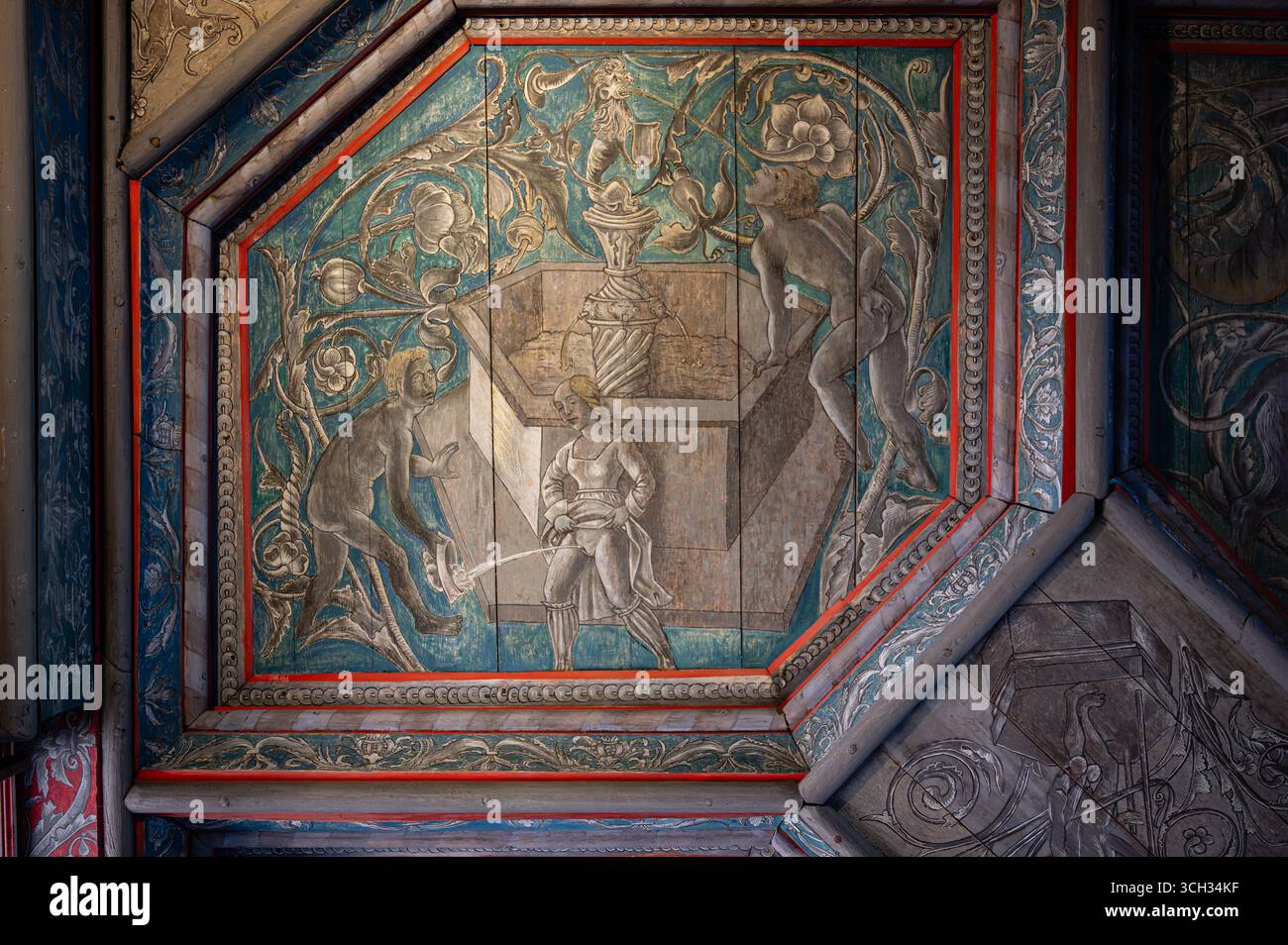 Foto ravvicinata di un pannello medievale in legno dipinto che raffigura una scena simbolica con una fontana e una figura femminile. Foto Stock