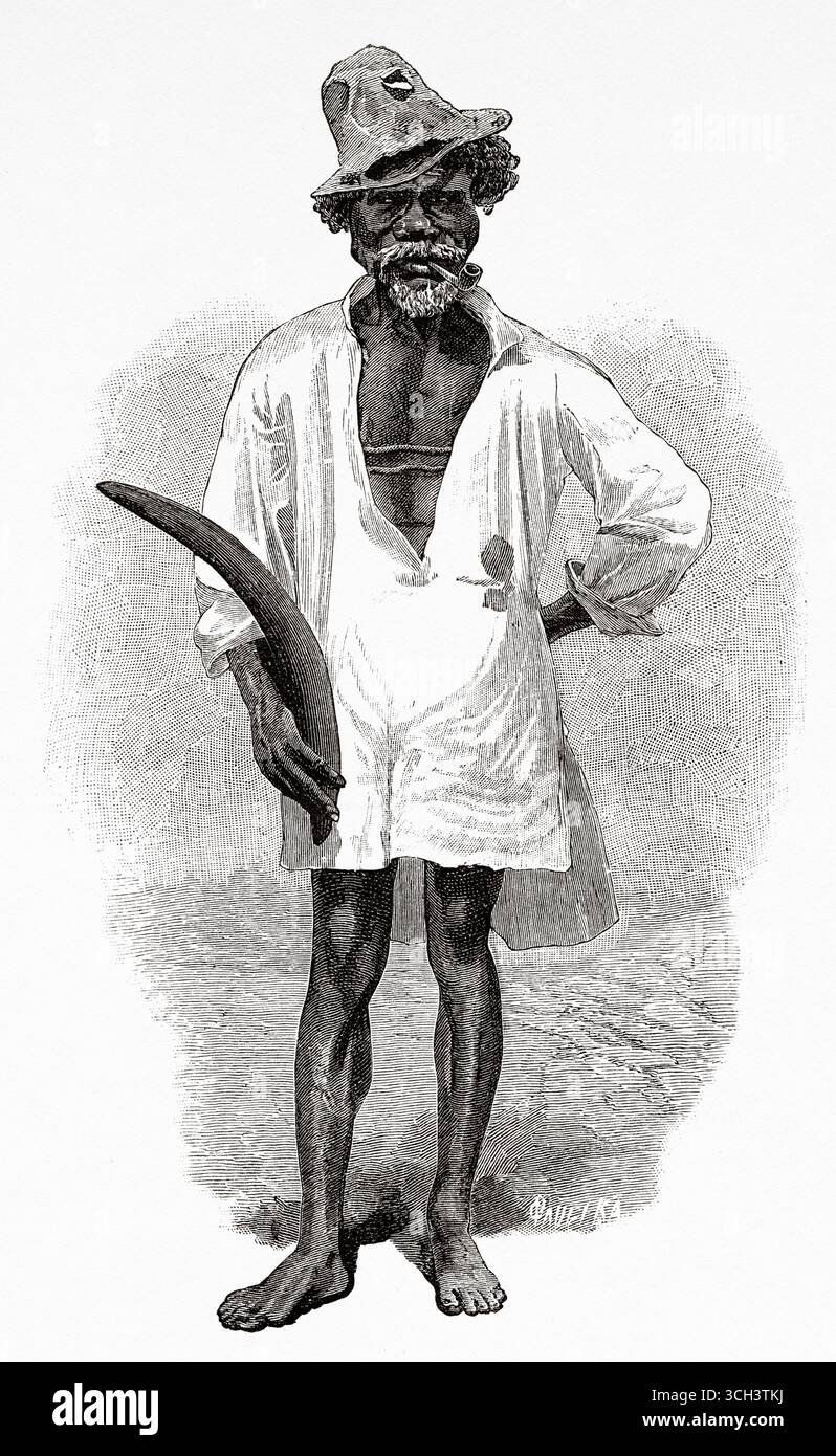 Jacky, un aborigeno australiano nero civilizzato che fuma una pipa e trasporta un boomerang. Australia, Oceania. Nella Terra dei Cannibali. Voyage of Exploration Among the Natives of Eastern Australia, 1880-1884 di Carl Lumholtz (1851-1922) le Tour du Monde del 1888 Foto Stock