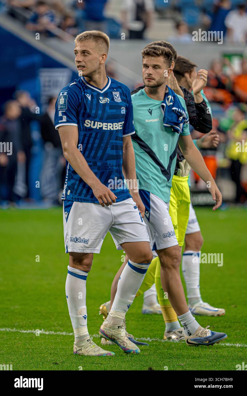 31 agosto 2025, Poznan, Polonia - Mateusz Skrzypczak di Lech Poznań in azione durante il PKO Ekstraklasa match tra Lech Poznań e Widzew Łódź. Foto Stock