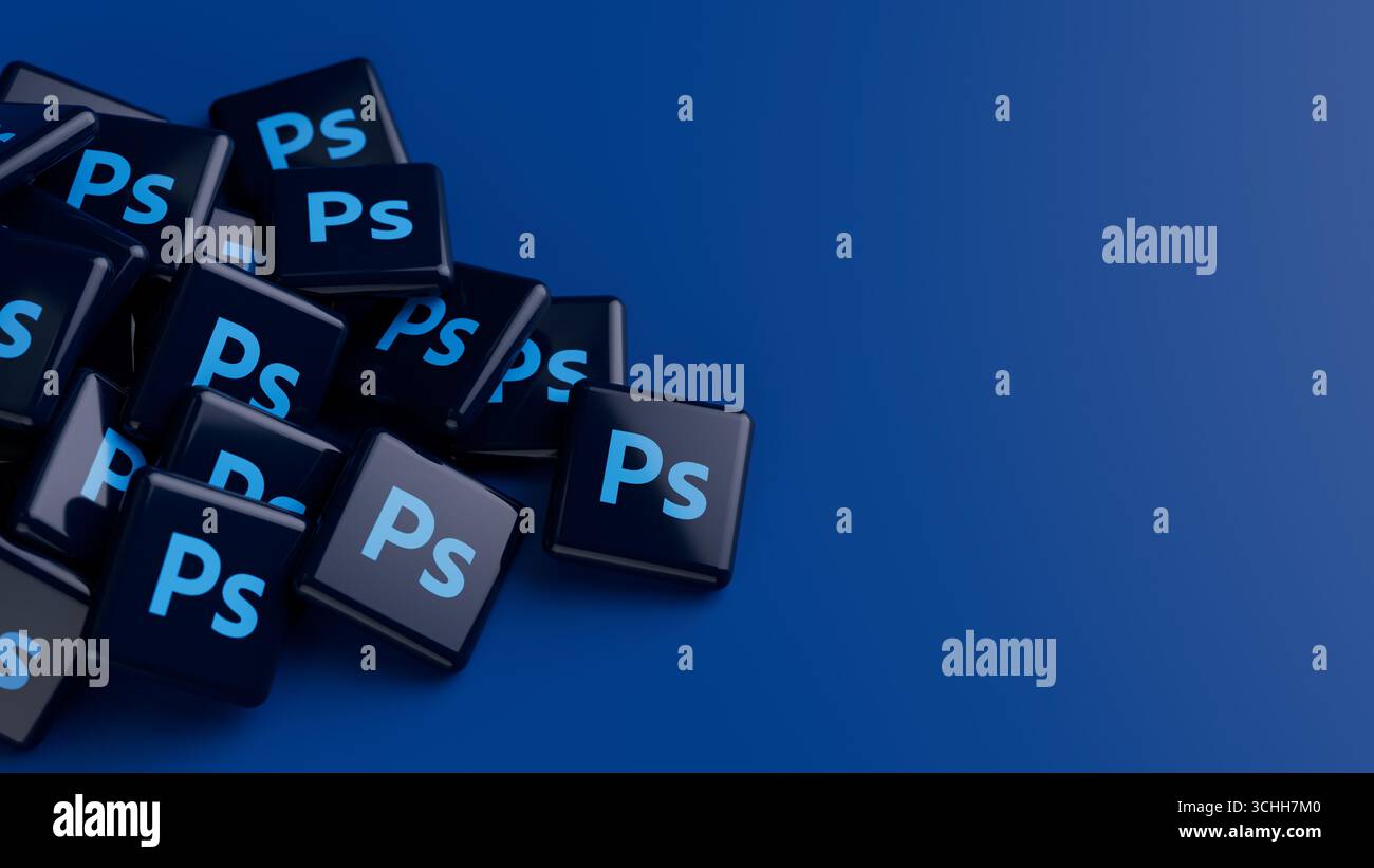 Logo del software Adobe Photoshop su una grande pila su sfondo blu con spazio di copia come intestazione banner Web Foto Stock