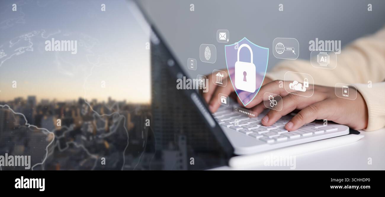 Utente che digita sul laptop con l'icona del lucchetto digitale e dello scudo. Concetto astratto di sicurezza informatica, protezione dei dati, accesso sicuro, privacy e rete moderna Foto Stock