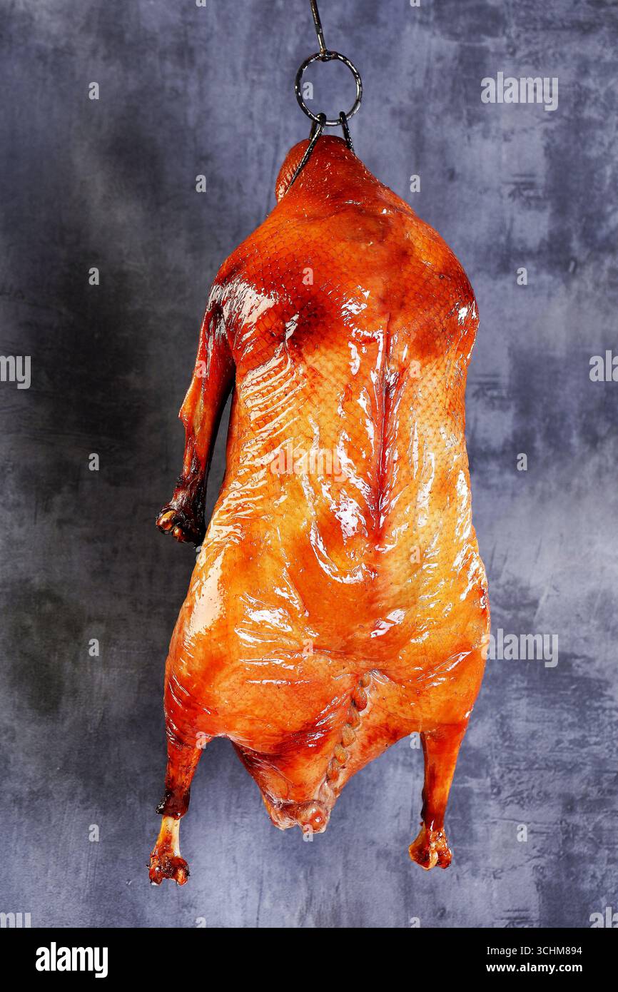 Oca arrosto cantonese a pozzetti profondi Foto Stock