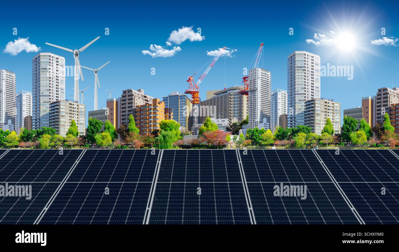 Energia verde prodotta da pannelli solari e turbine eoliche per la moderna Smart City, produzione di energia pulita Metro eco per il concetto futuro Foto Stock