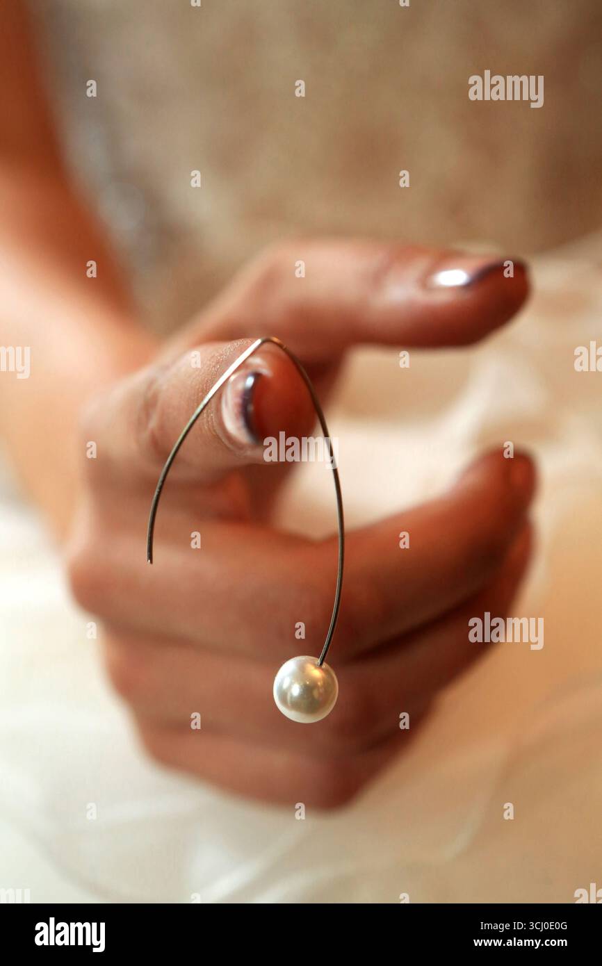 Boucle d'oreille. Foto Stock