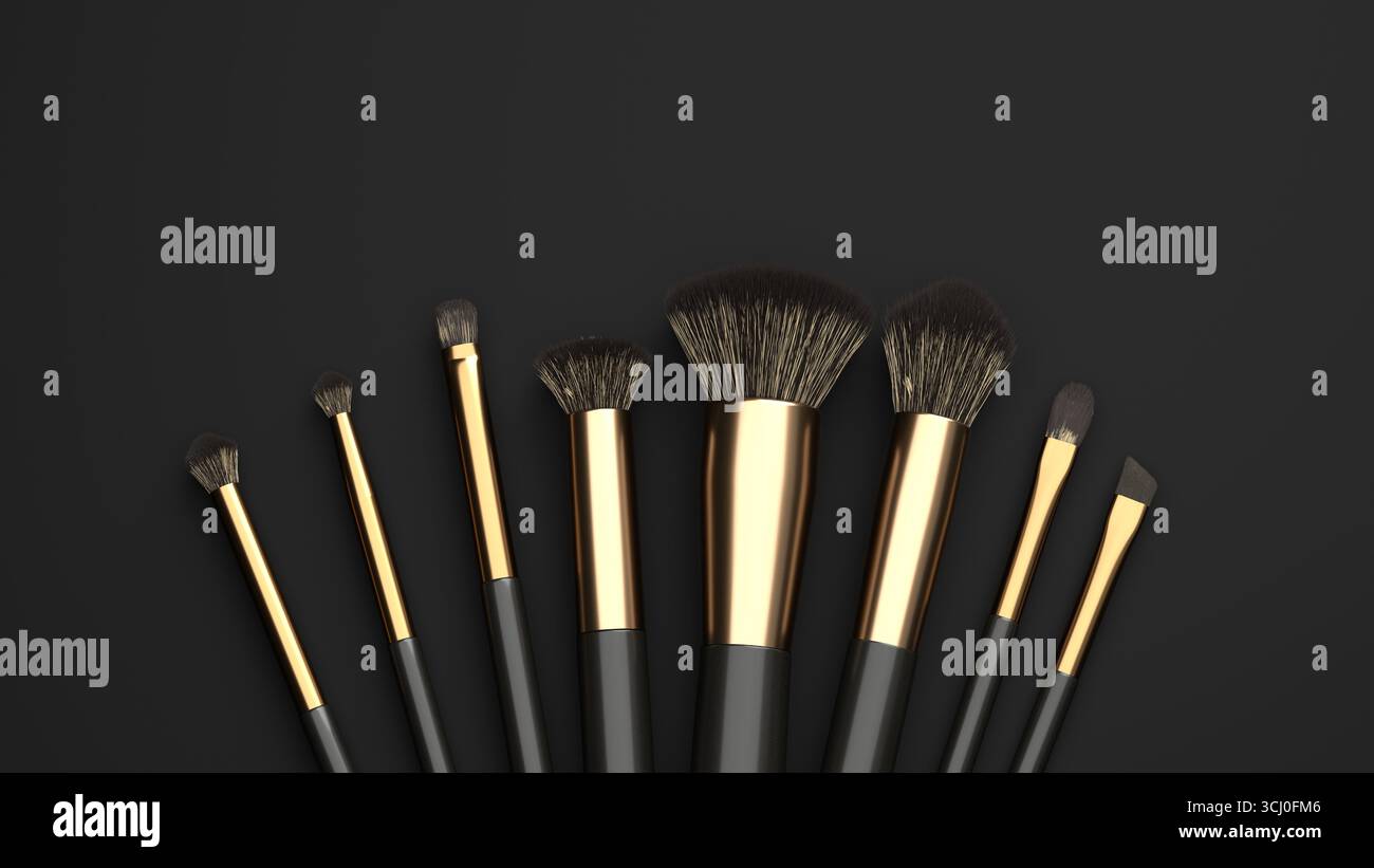 Vari pennelli per il trucco sono visualizzati su uno sfondo scuro, mostrando le loro diverse forme e dimensioni. Ogni spazzola presenta eleganti manici neri e oro Foto Stock