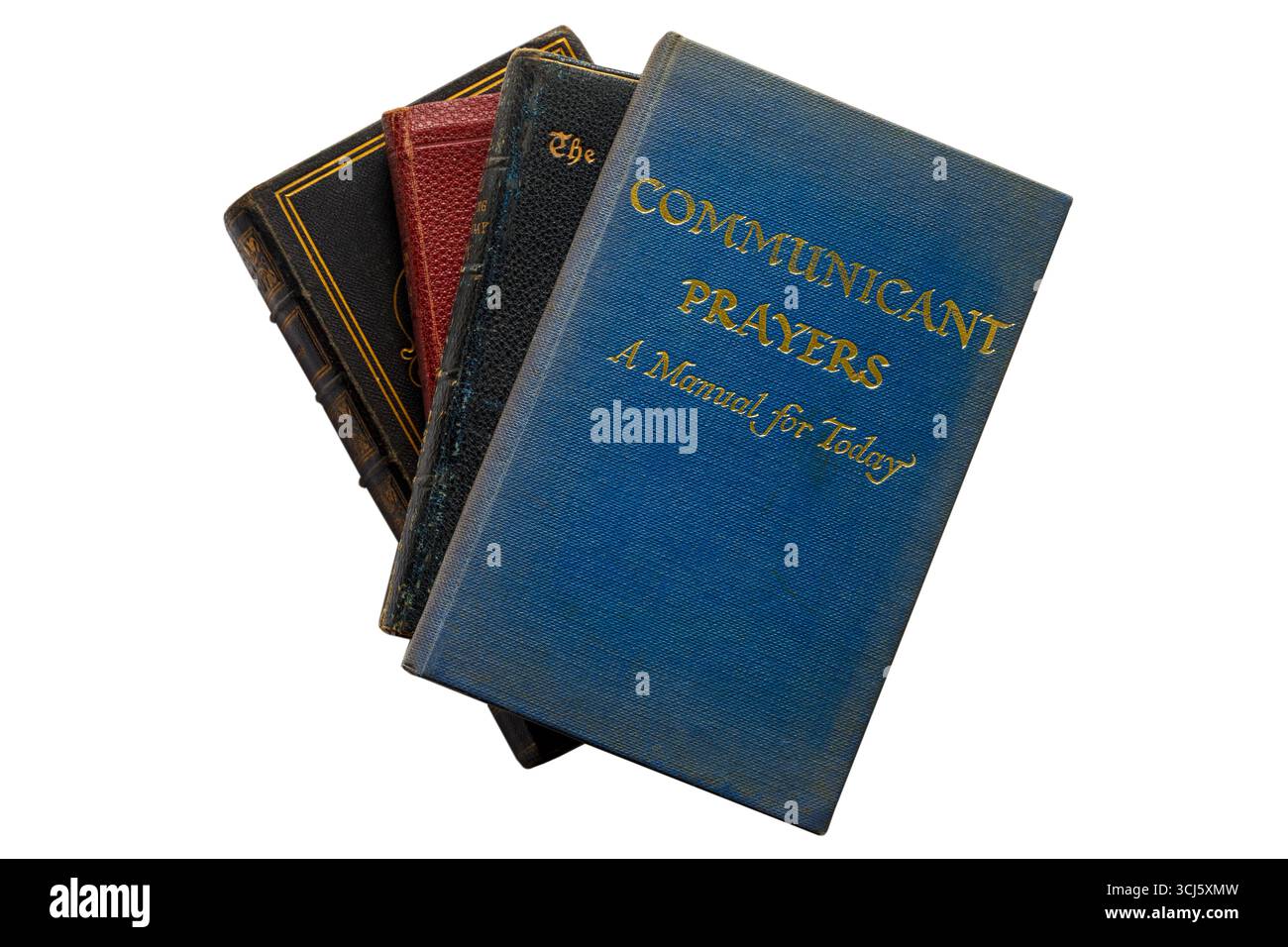 Selezione di libri religiosi con preghiere comunicanti un manuale per il libro di oggi isolato in alto su sfondo bianco - dal 1965 Foto Stock