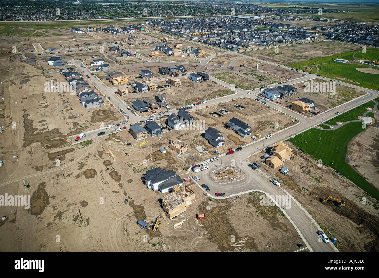 Veduta aerea di Brighton, un quartiere di Saskatoon, Saskatchewan, ed è la prima di diverse comunità pianificate per il Suburban di Holmwood Foto Stock