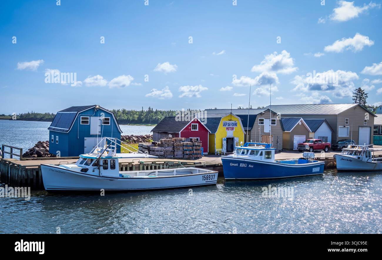 Barche da pesca al New London Wharf sull'Isola del Principe Edoardo in Canada Foto Stock