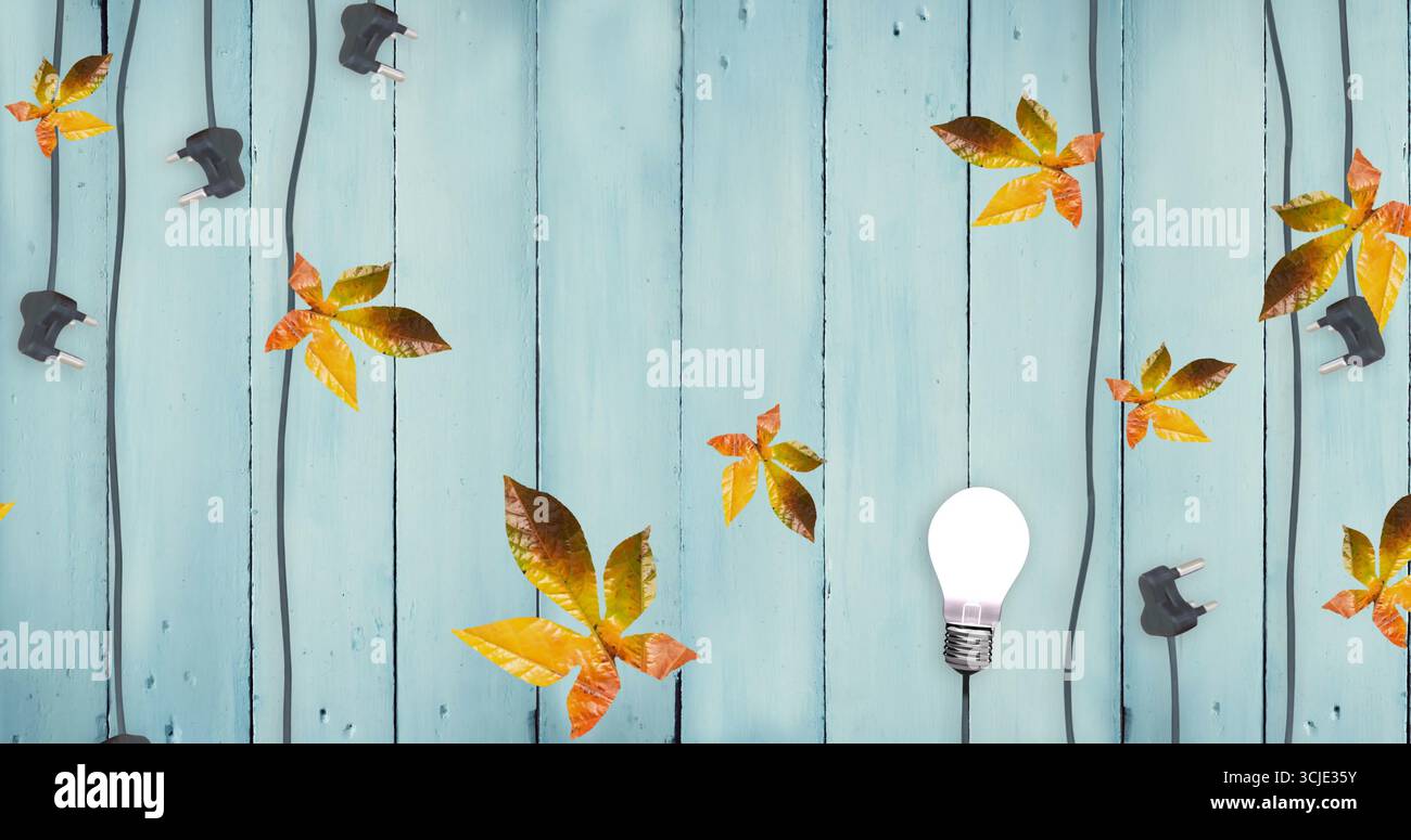 Immagine delle foglie autunnali su tavole di legno blu Foto Stock