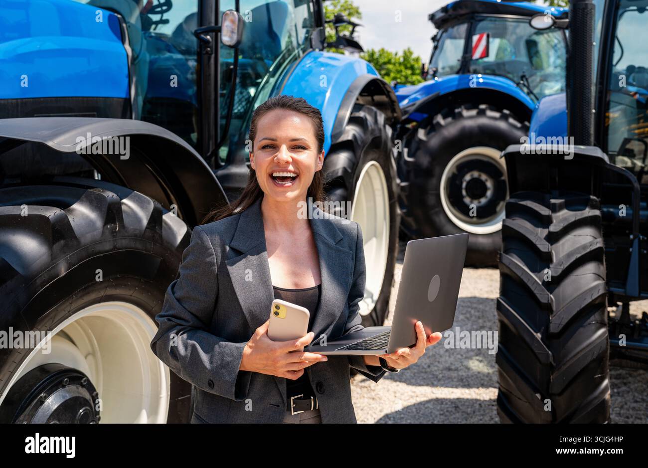 Responsabile vendite donna di macchinari agricoli. Foto Stock