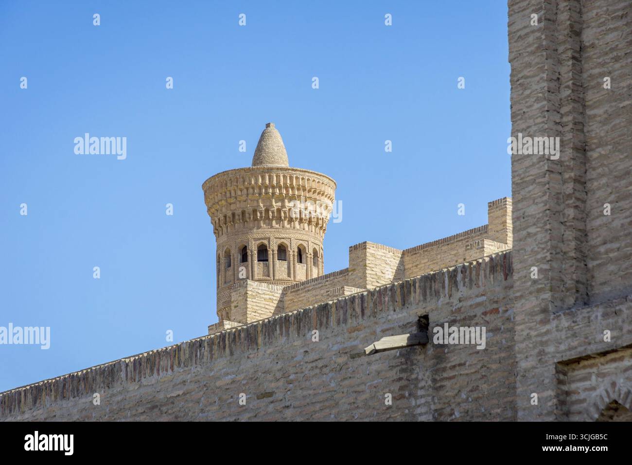 Minareto Kalyan e la parete, Bukhara, Uzbekistan Foto Stock