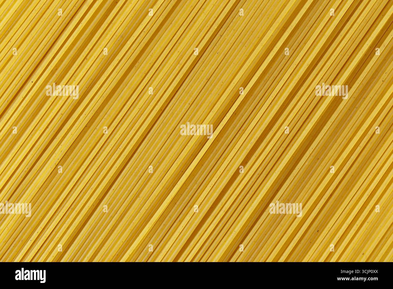Sfondo a strisce gialle e marroni con pasta. La pasta è a zigzag Foto Stock