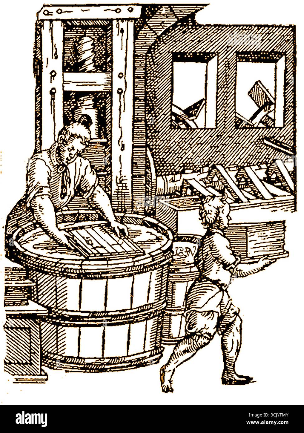 Produzione di carta in una piccola azienda familiare medievale nel Regno Unito. Foto Stock