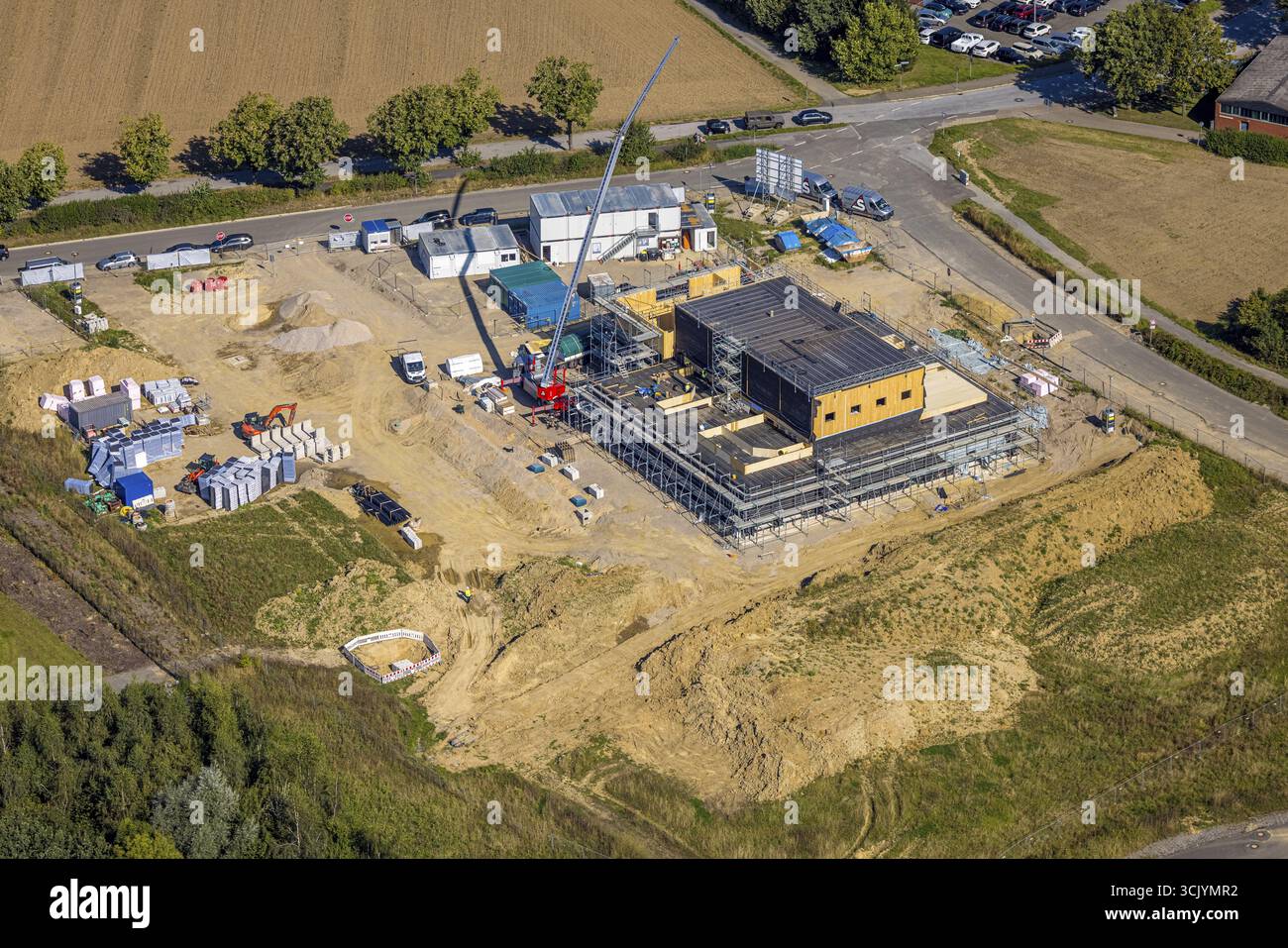 Vista aerea, area di costruzione con il nuovo parco di innovazioni edilizie Heiligenhaus area commerciale Bertha-Benz-Allee, edificio aziendale con ponteggi, He Foto Stock