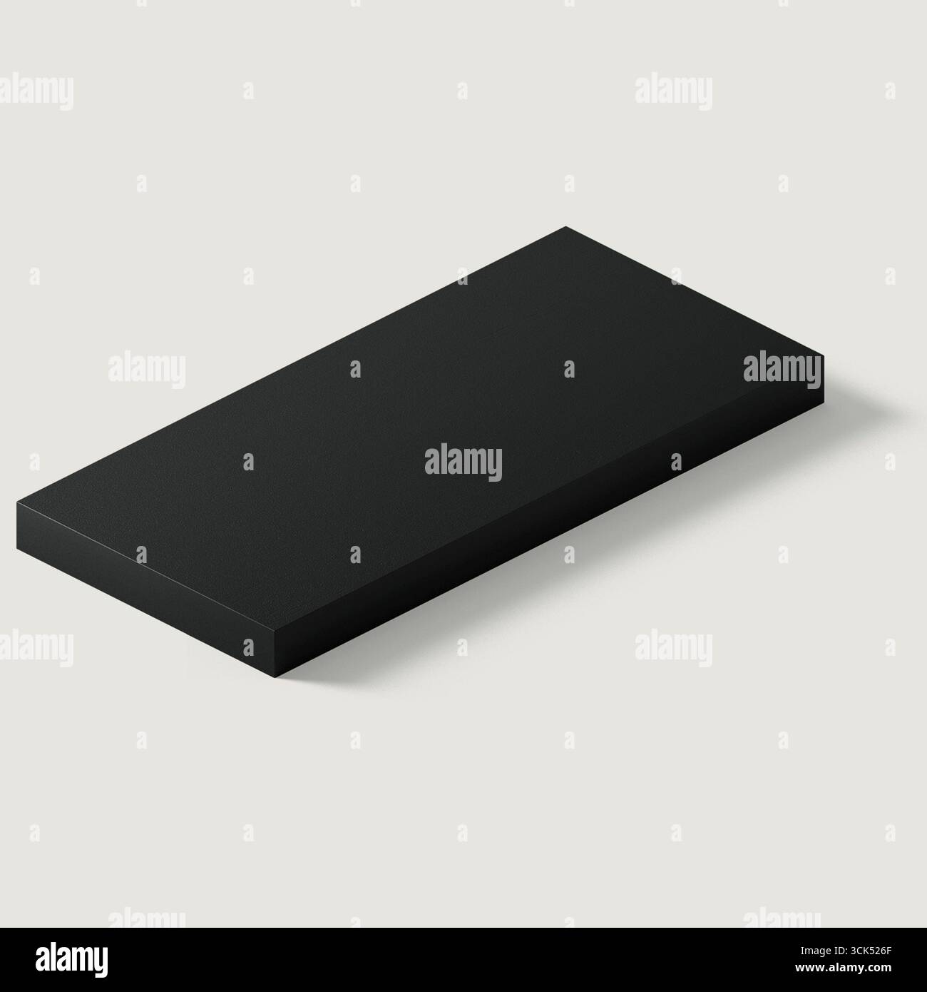 Un semplice oggetto rettangolare nero, possibilmente una piattaforma o un pezzo da esposizione, posizionato su uno sfondo neutro. Foto Stock