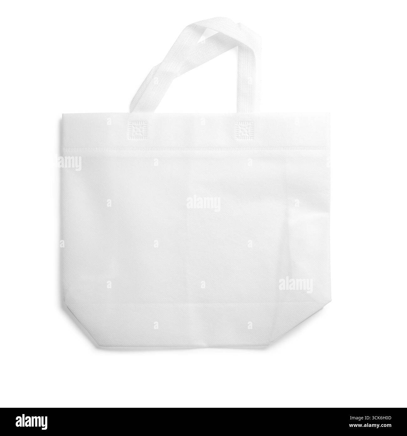 Una semplice borsa tote bianca con due manici, adatta per lo shopping o il trasporto di articoli. Foto Stock