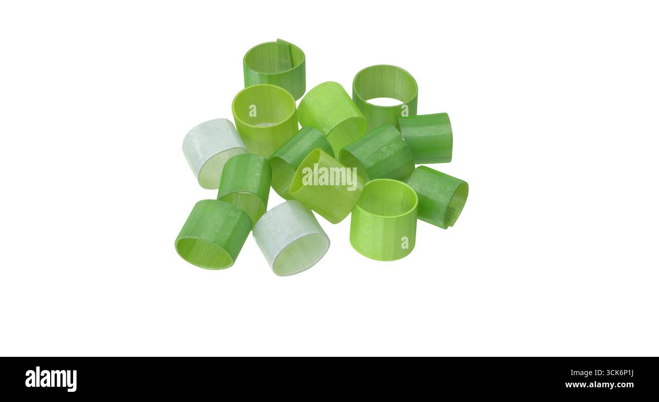 Una collezione di oggetti cilindrici verdi e traslucidi, eventualmente utilizzati per l'artigianato o la decorazione. Foto Stock