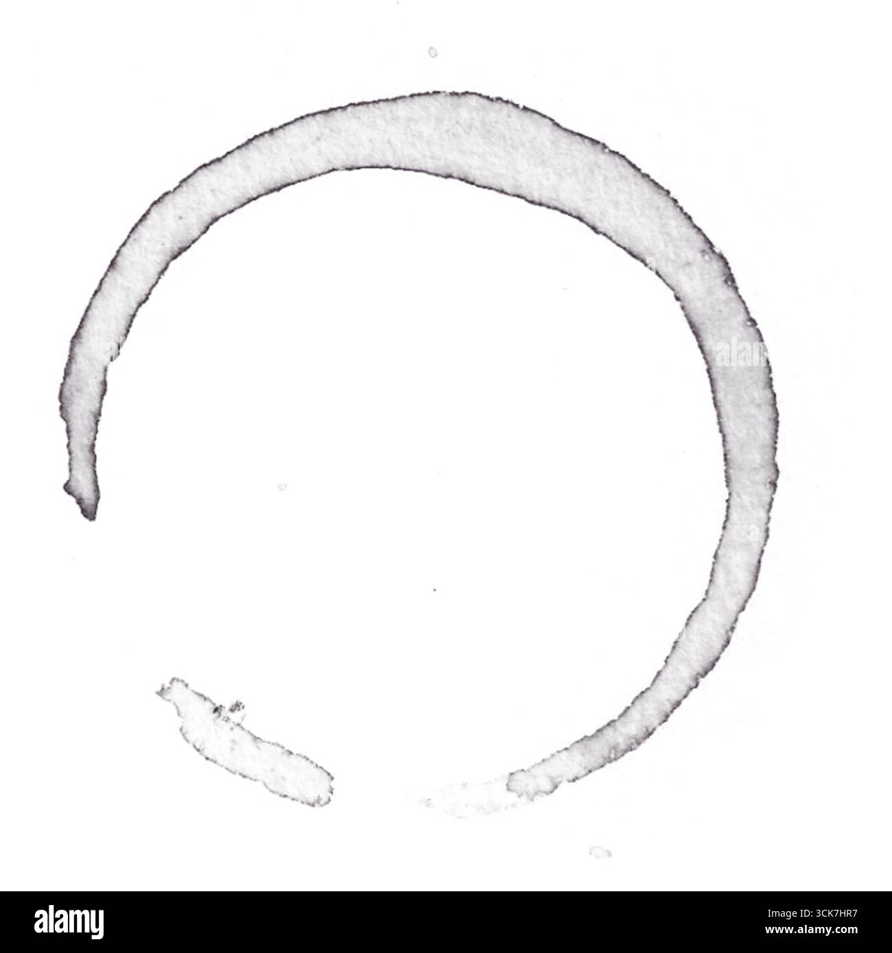 Un semplice segno circolare di inchiostro, che potrebbe rappresentare un anello di caffè o una pennellata artistica. Foto Stock