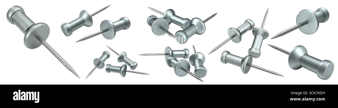 Una collezione di perni a pressione in argento di varie dimensioni, utilizzati per fissare note o documenti. Foto Stock