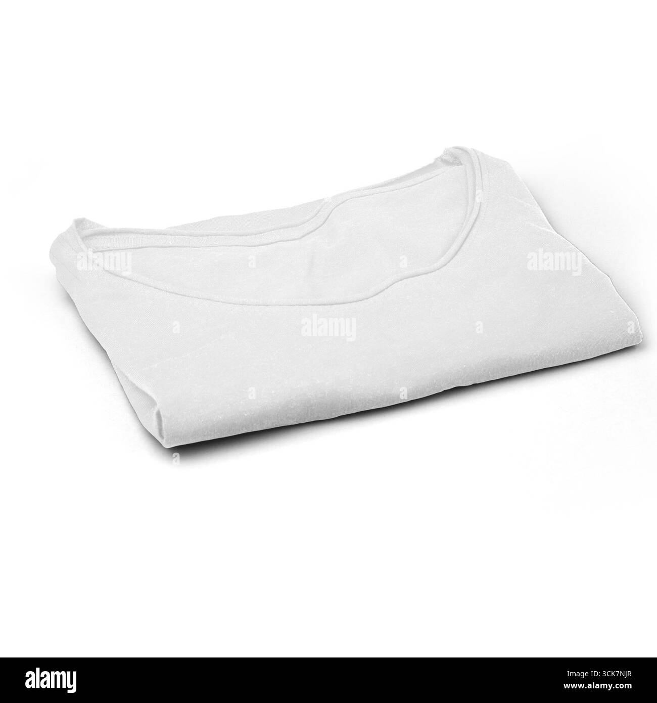 Una t-shirt bianca piegata in modo ordinato, che mostra semplicità e versatilità nell'abbigliamento. Foto Stock