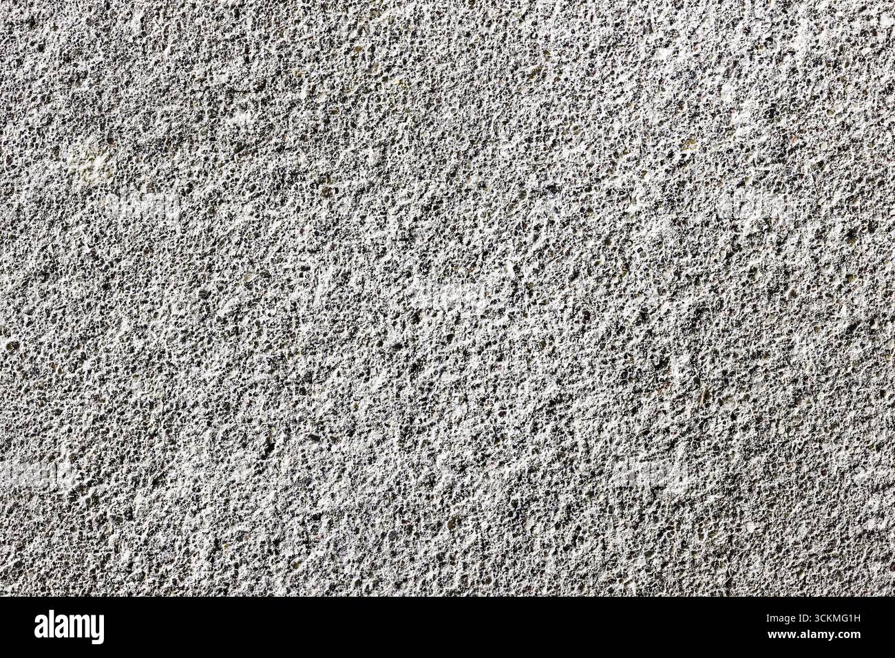 Sfondo della superficie della parete in calcestruzzo. Struttura in cemento grigio con dettagli ruvidi. Schema dei materiali da costruzione industriali. Scenario astratto di URBAN. Foto Stock