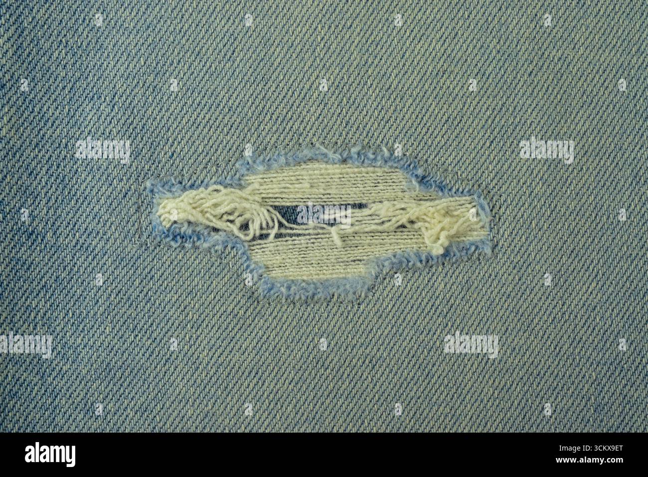 sfondo trame jean strappato Foto Stock