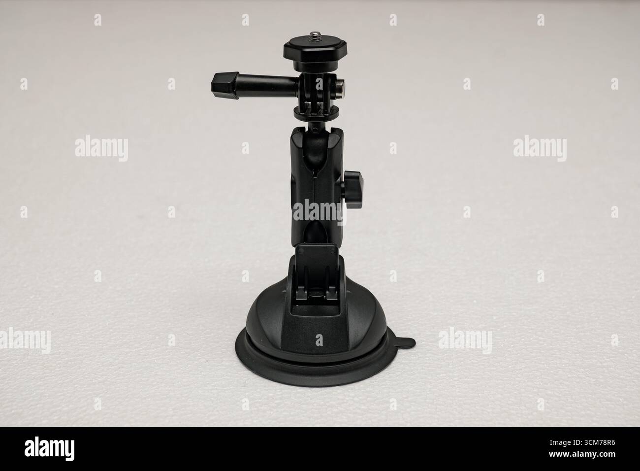 Supporto per fotocamera nero con base a ventosa, braccio regolabile e piastra a sgancio rapido Foto Stock