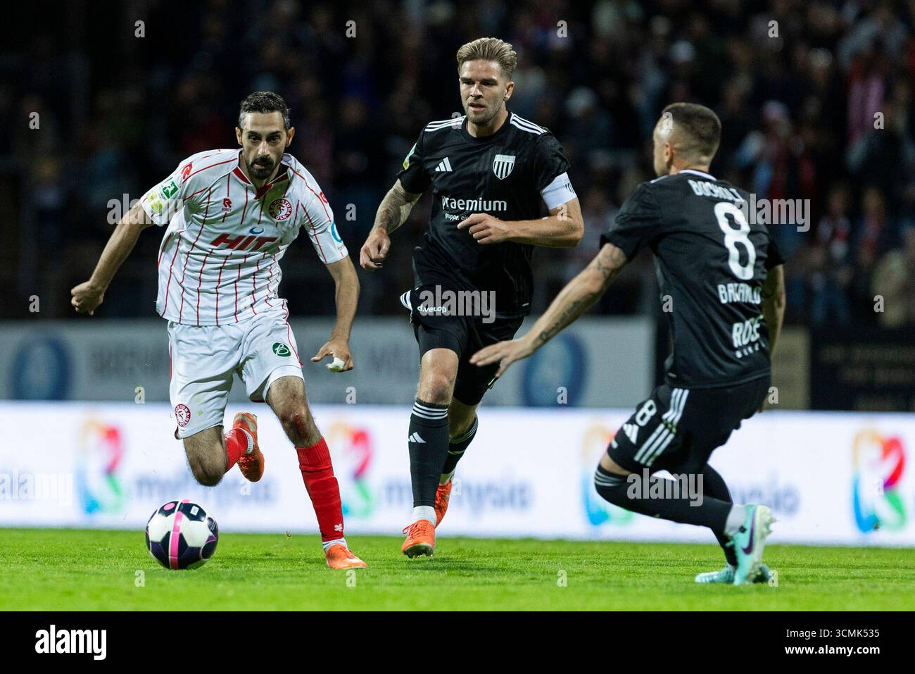Rafael Garcia (fortuna K?ln, 10), Jan Holldack (1. FC Bocholt, 10), Stipe Batarilo (1. FC Bocholt, 8). Regionalliga West, fortuna K'ln - 1. FC Bocholt, 8. Spieltag, AM 16.09.2025, S?dstadion, K?ln Foto Stock