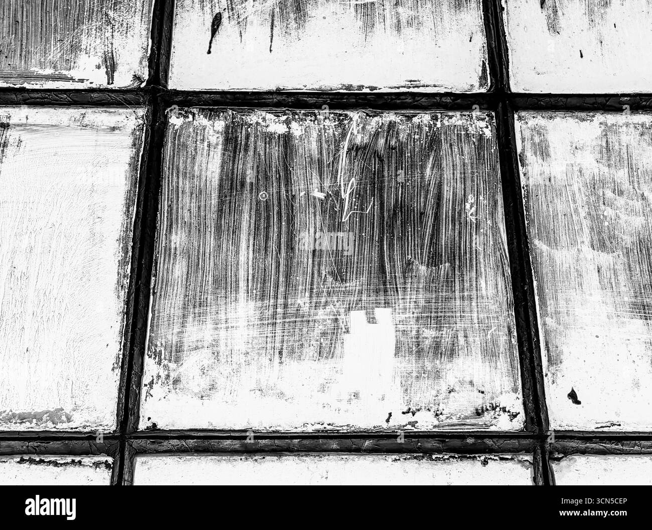 Cornici per finestre quadrate invecchiate – vernice e texture intemperie. Tonalità monocromatiche. Foto Stock