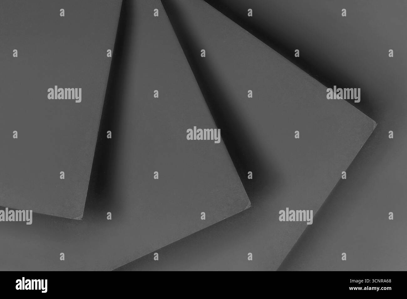 Primo piano di sfondo dei fogli bianchi neri astratti Foto Stock
