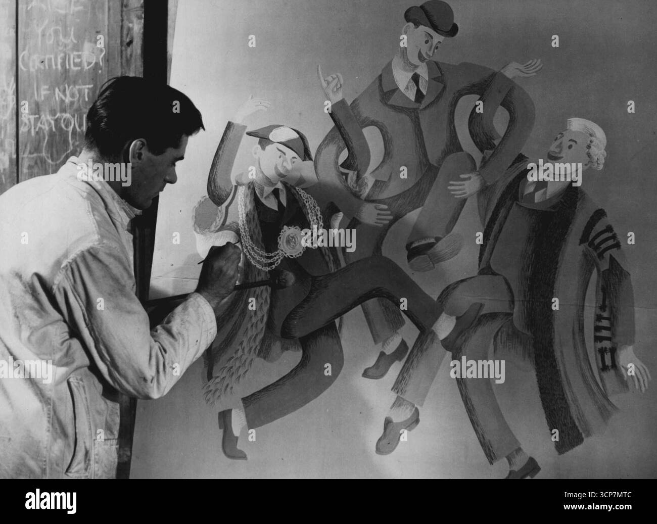 Il loro primo grande lavoro -- il ventitreenne ex militare Charles Feeney sta dipingendo un murale intitolato "democrazia" per la mostra. È stato progettato per sottolineare la cooperazione necessaria tra il cittadino e i suoi consiglieri eletti.sedici studenti del Dipartimento d'Arte della Brixton School of Building stanno contribuendo a costruire una mostra su vasta scala per la settimana Civica del Lambeth Council che apre nel Municipio dal 18 al 26 settembre. Lavorando in un grande deposito A.R.P. in disuso a Brixton, dipingono murales, costruiscono stand e cornici, e progettano set che mostreranno la storia di Lambeth e del b Foto Stock