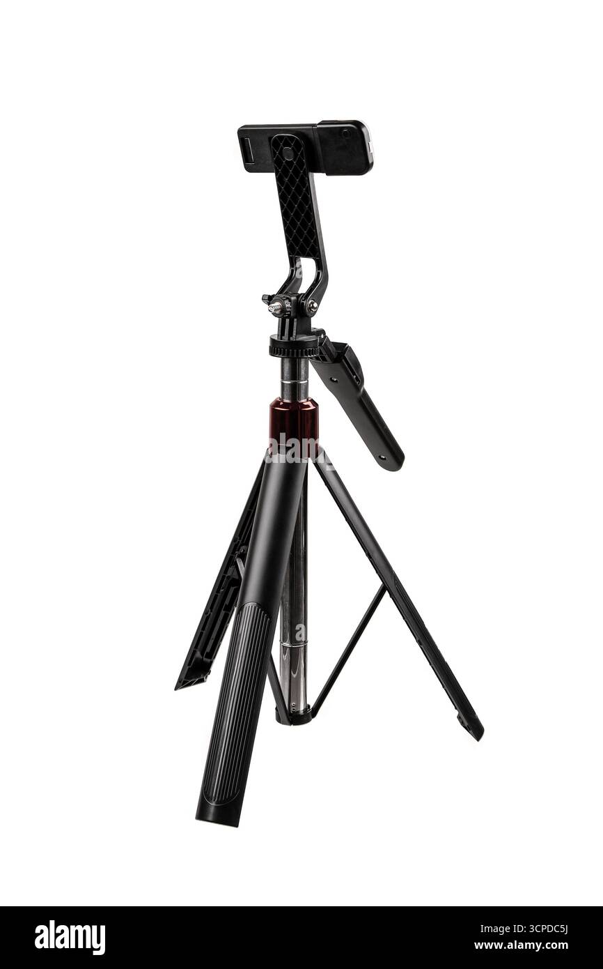 Treppiede da tavolo compatto con supporto per smartphone e luce LED integrata. Foto Stock