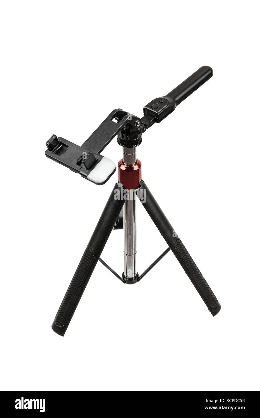 Treppiede da tavolo compatto con supporto per smartphone e luce LED integrata. Foto Stock