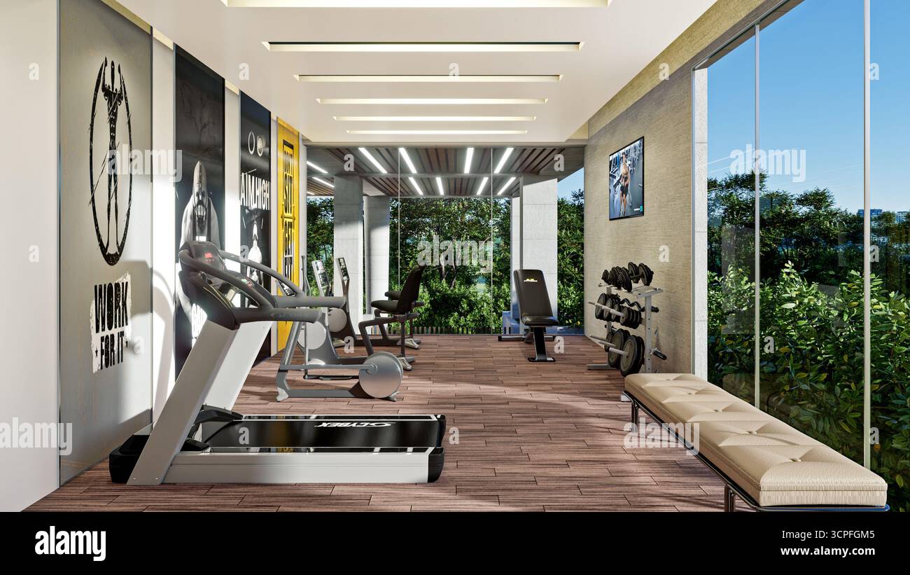 Vivace e moderna palestra o sala fitness con grandi finestre, pavimento in legno e grafica Foto Stock