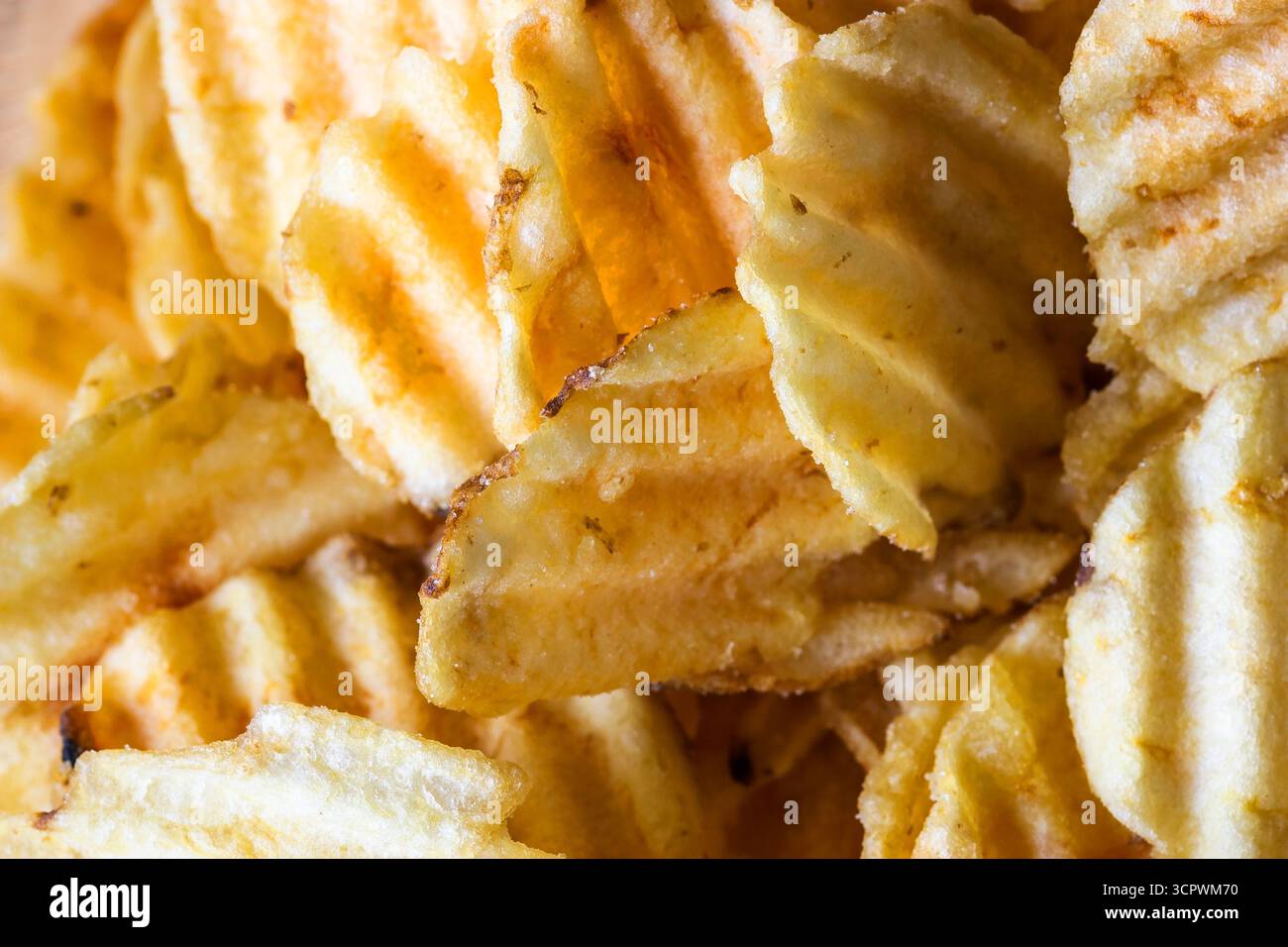 Primo piano di gustose patatine salate Foto Stock