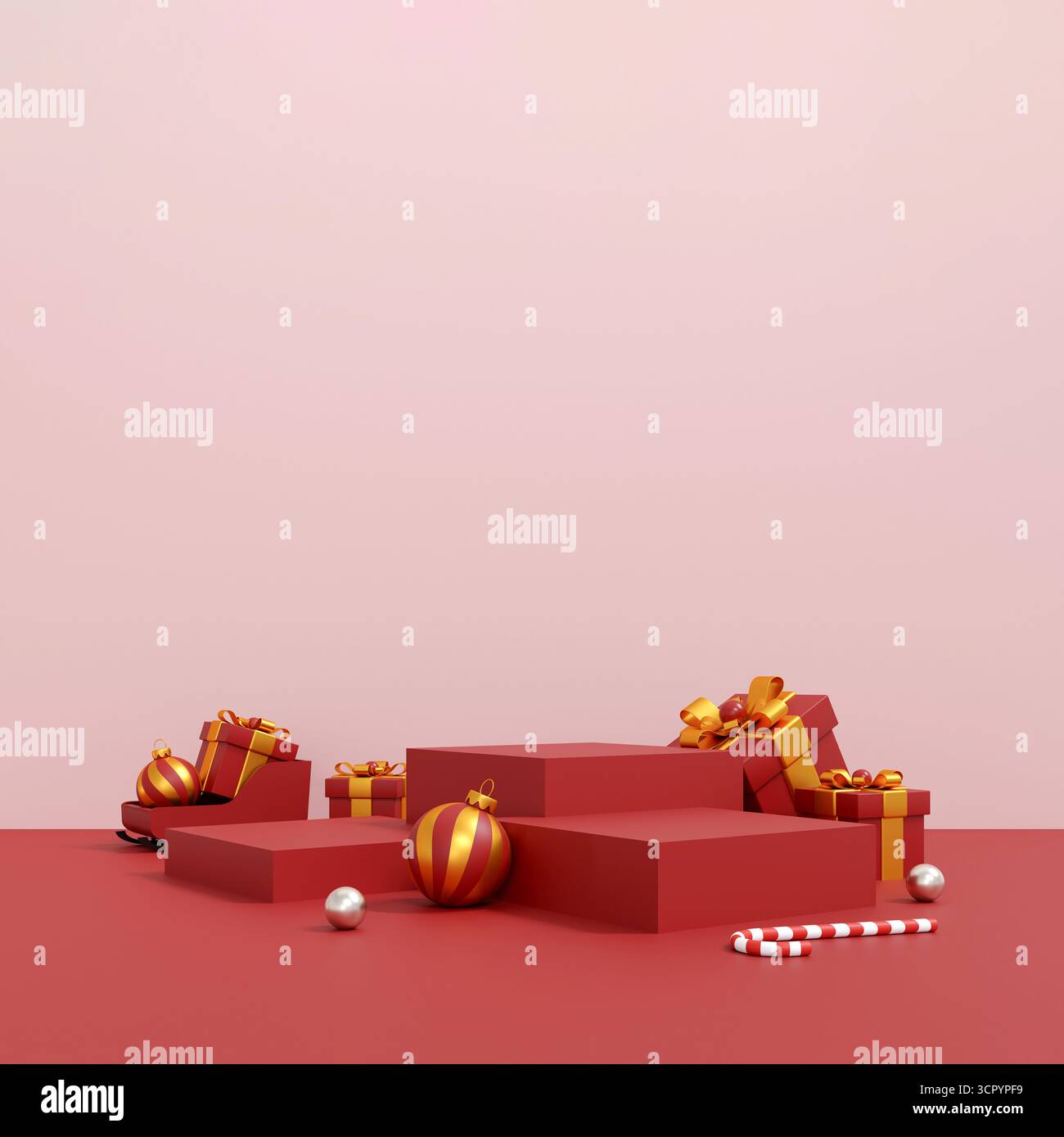 Scena del podio natalizio con scatole regalo rosse, ornamenti e canna di caramelle in un design minimalista per le feste Foto Stock
