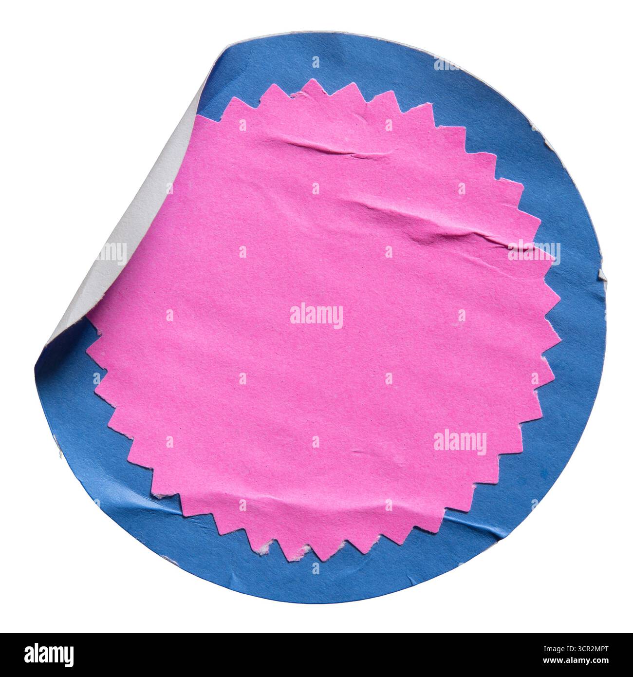 Un adesivo di carta per etichette di vendita con un cerchio blu e un cerchio con bordo a zigzag rosa all'interno. Foto Stock