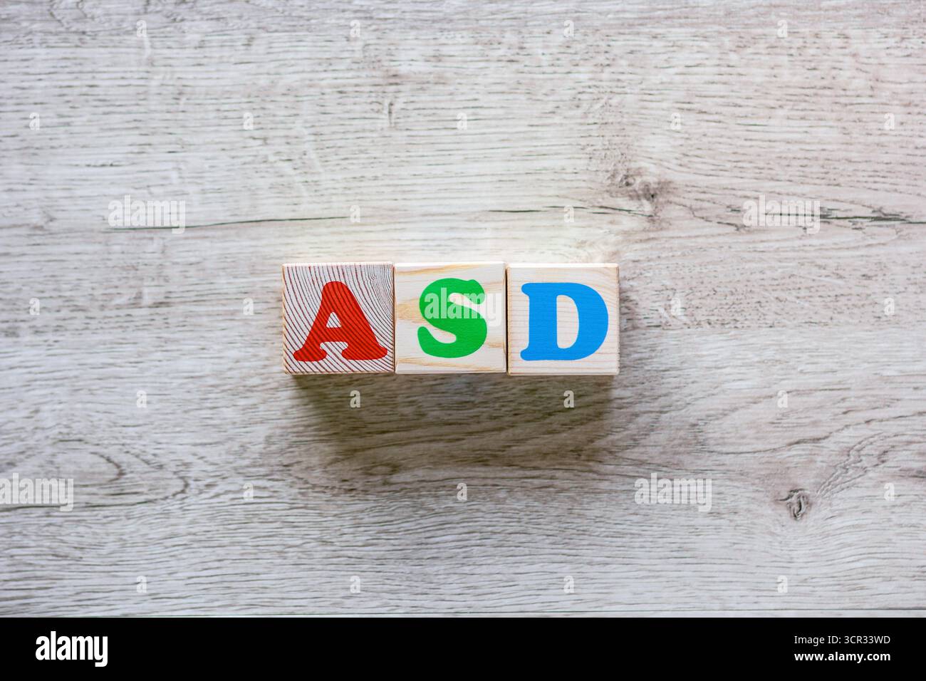 Testo ASD costruito da blocchi di legno Foto Stock