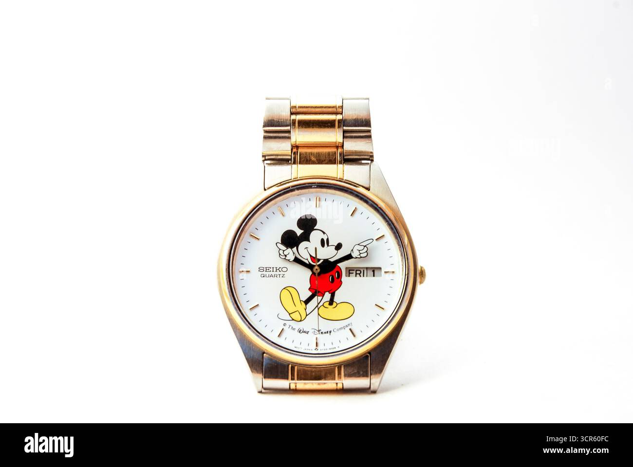 Un moderno orologio Topolino del marchio Walt Disney Seiko con fascia metallica degli anni '1980 Foto Stock