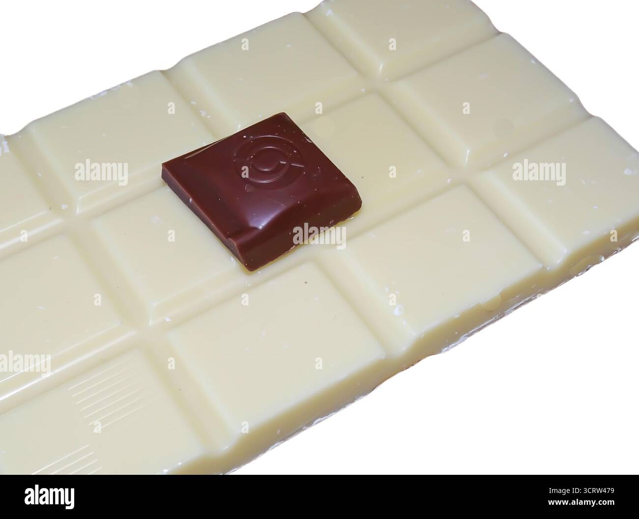 Cioccolato bianco e un altro pezzo di cioccolato Foto Stock