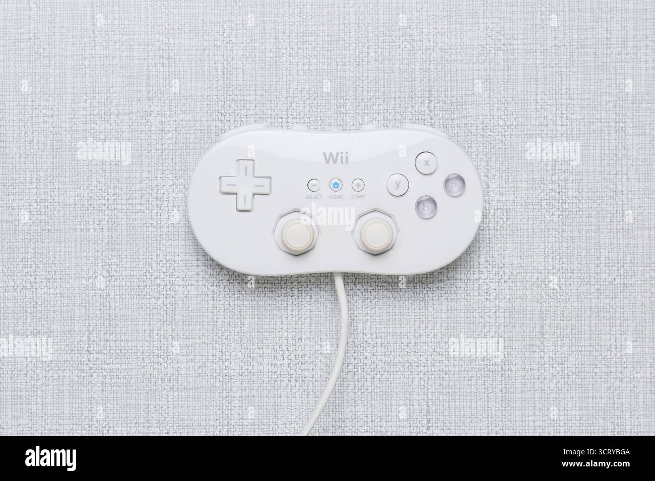 Top Shot eines Wii Classic Controllers auf einer Weißen Resopal Platte editoriale Usa solo *** Top shot di un controller Wii Classic su un Resopal bianco Foto Stock