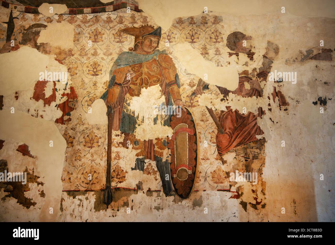 Italien, Urbino, 09.09.2025 Der Palazzo Ducale ist ein im Wesentlichen im Auftrag von Graf Federico da Montefeltro zwischen 1463 und 1472 errichteter Herzogspalast der Renaissance in der italienischen Stadt Urbino in der Region Marken. Er zaehlt heute zum Weltkulturerbe der UNESCO. Die Galleria Nazionale delle Marche Nationalgalerie, Die der Palast beherbergt, ist eine der bedeutendsten Kunstsammlungen der Renaissance weltweit. Foto: Appartamento della Jole, Kamin und Fresken von Giovanni Boccati aus Camerino, UNESCO-Weltkulturerbe, teilweise Rekonstruktion der Nordwand Stadt Urbino Stadt Urbi Foto Stock